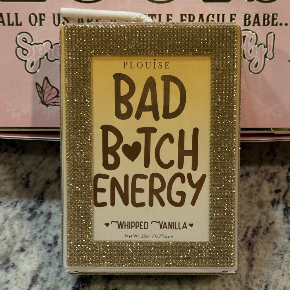 P.Louise Bad B*tch Energy Whipped Vanilla “Crystal Box” Gold tone.  New/Sealed